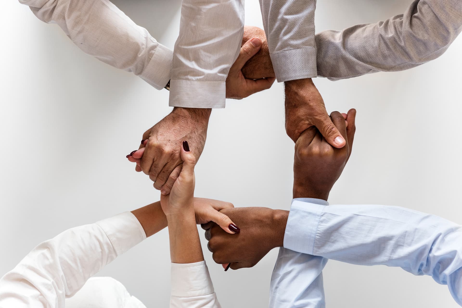 Business professionals collaborating during a workforce strategy meeting.